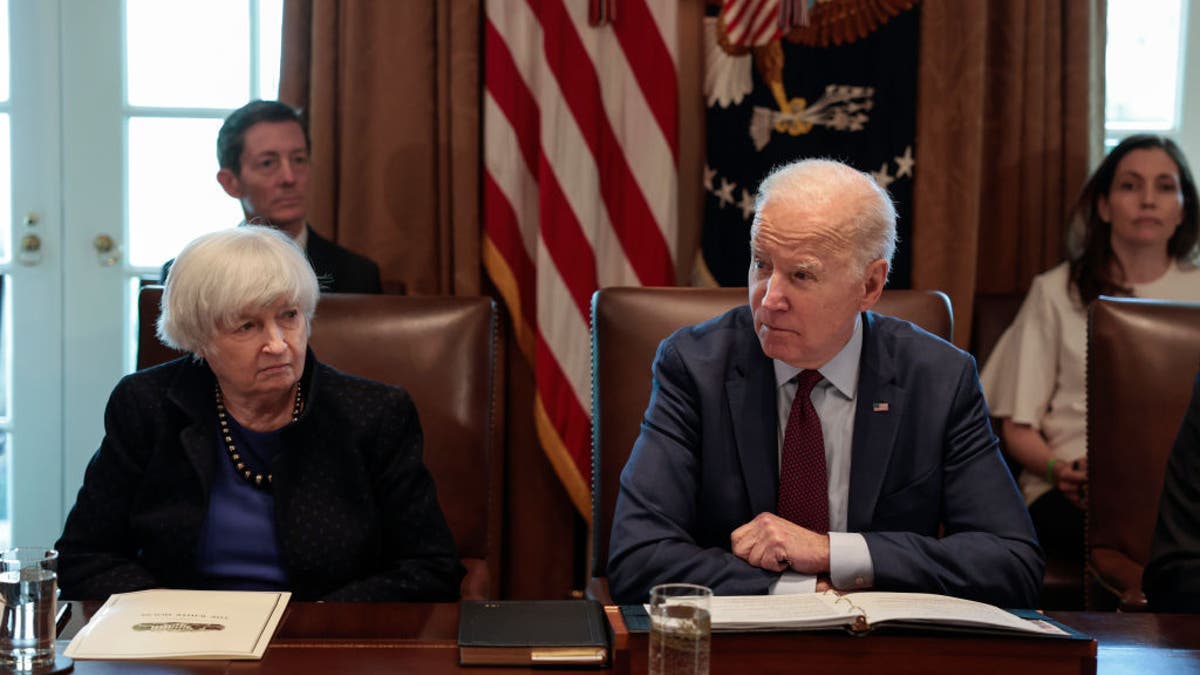 WASHINGTON, DC - MARCH 03: U.S. Secretary of the Treasury Janet Yellen listens as U.S. President Joe Biden speaks to reporters before the start of a cabinet meeting in the Cabinet Room of the White House on March 03, 2022 in Washington, DC. Earlier today, President Biden spoke on a secure video call with fellow Quad Leaders, Prime Minister Scott Morrison of Australia, Prime Minister Narendra Modi of India, and Prime Minister Kishida Fumio of Japan, to discuss the war in Ukraine. (Photo by Anna Moneymaker/Getty Images)