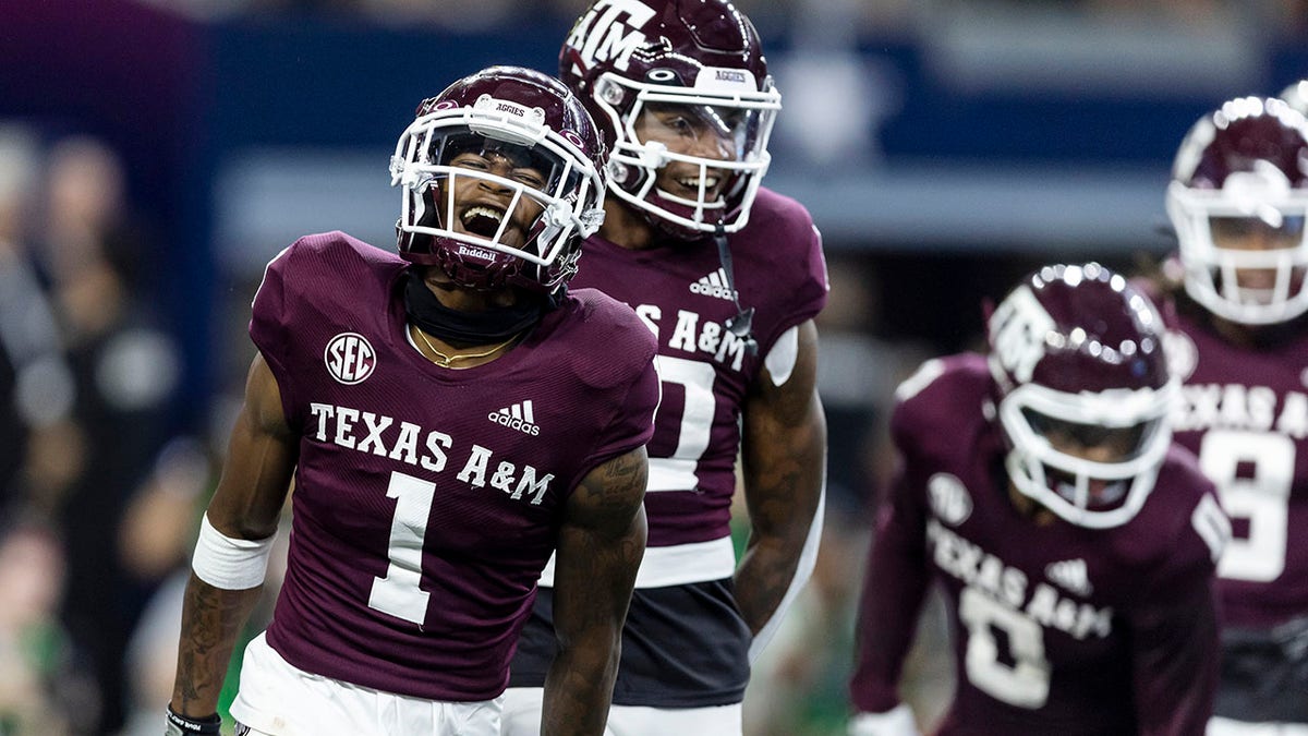 No. 23 Texas A&M’s fumble recovery handed off for touchdown propels Aggies over No. 10 Arkansas