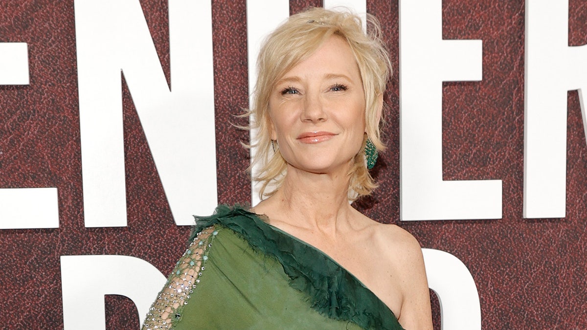 Actress Anne Heche posing at a red carpet event in Los Angeles