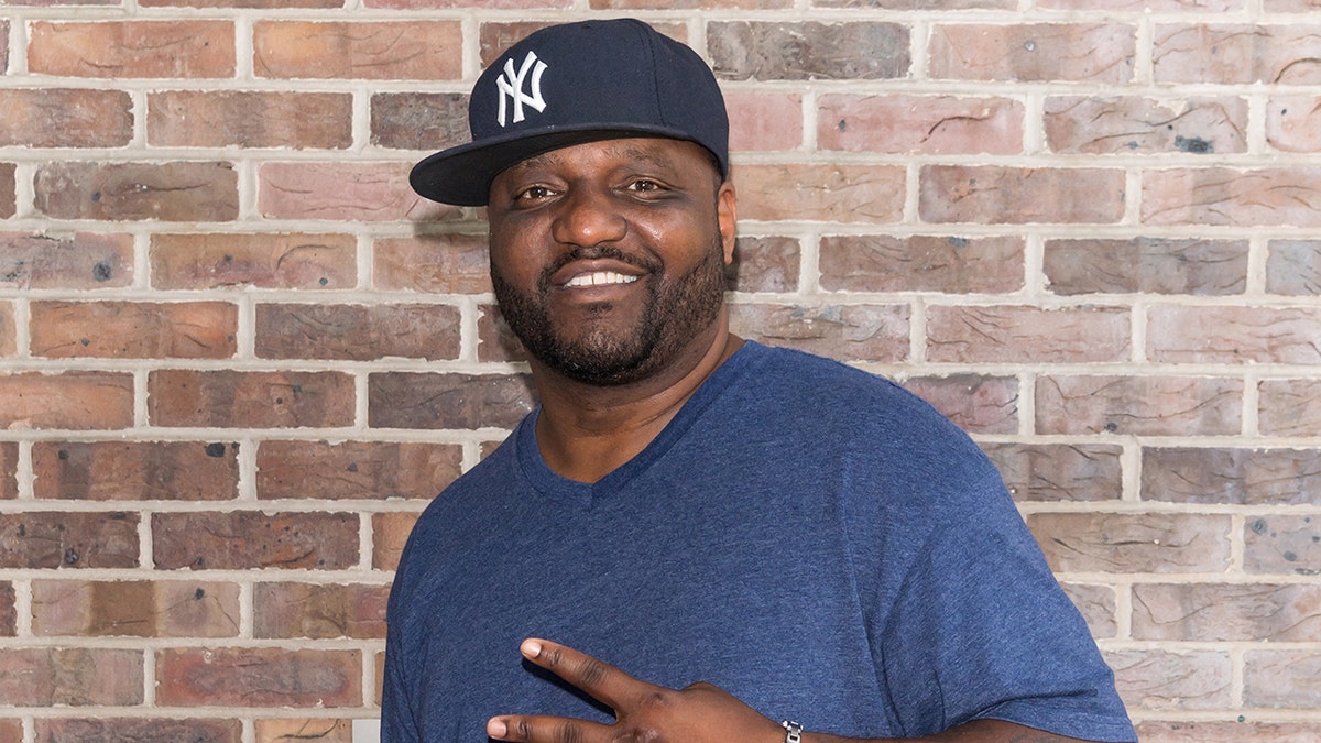 Aries Spears smiling
