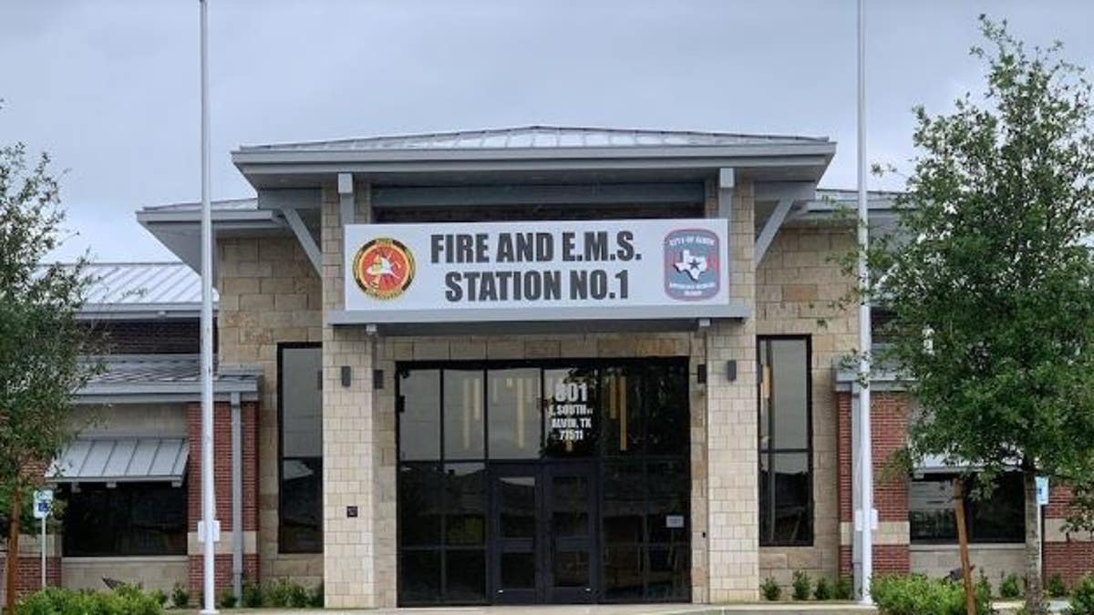 Front of a building with a banner welcoming first responders 