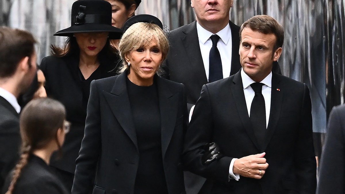 French President Emmanuel Macron and his wife Brigitte arrive at Westminster Abbey wearing all black for Queen Elizabeths state funeral