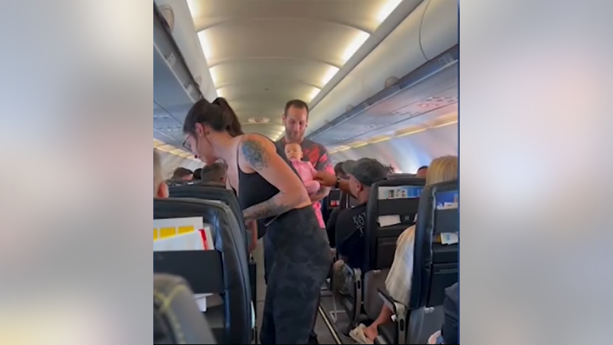 parents of baby saved on flight
