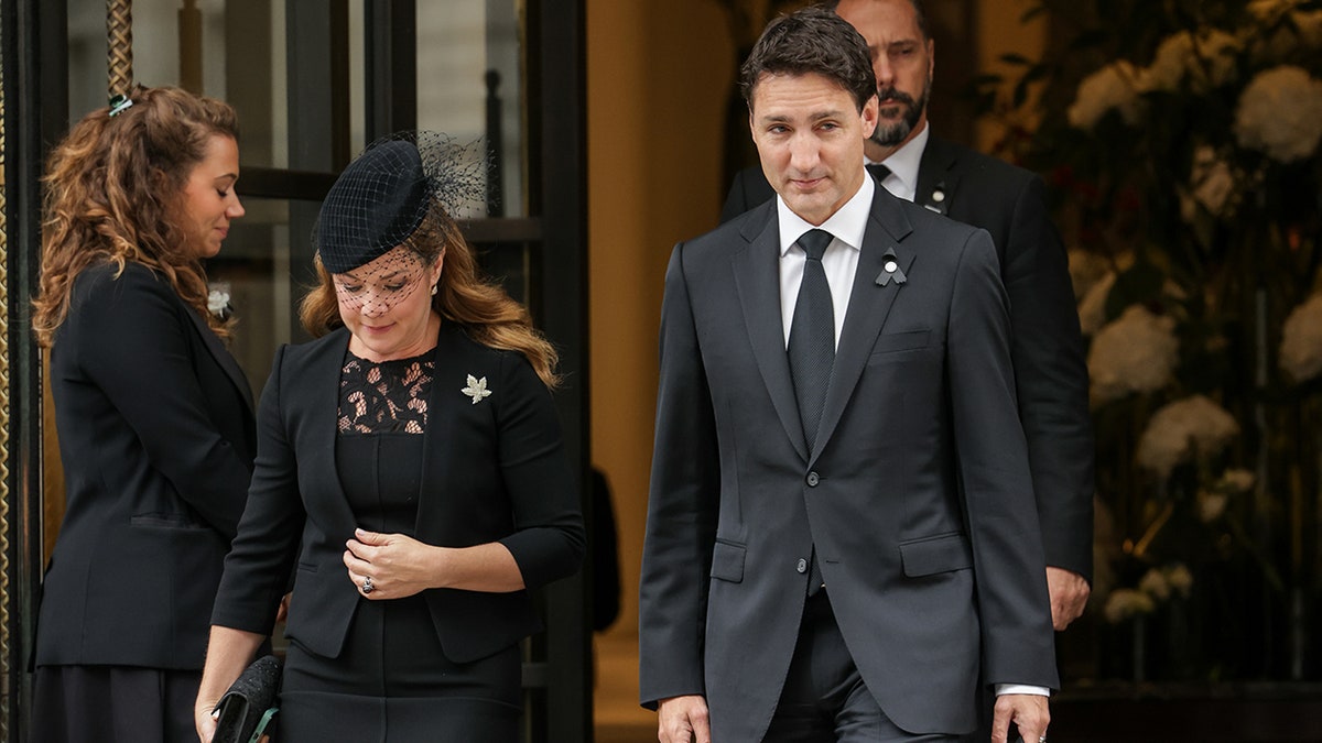 Canadian PM Justin Trudeau and his wife wear all black en route to Queen Elizabeth's state funeral.