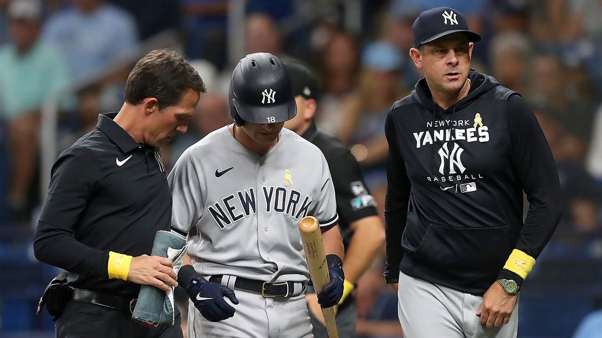 Andrew Benintendi leaves with trainer