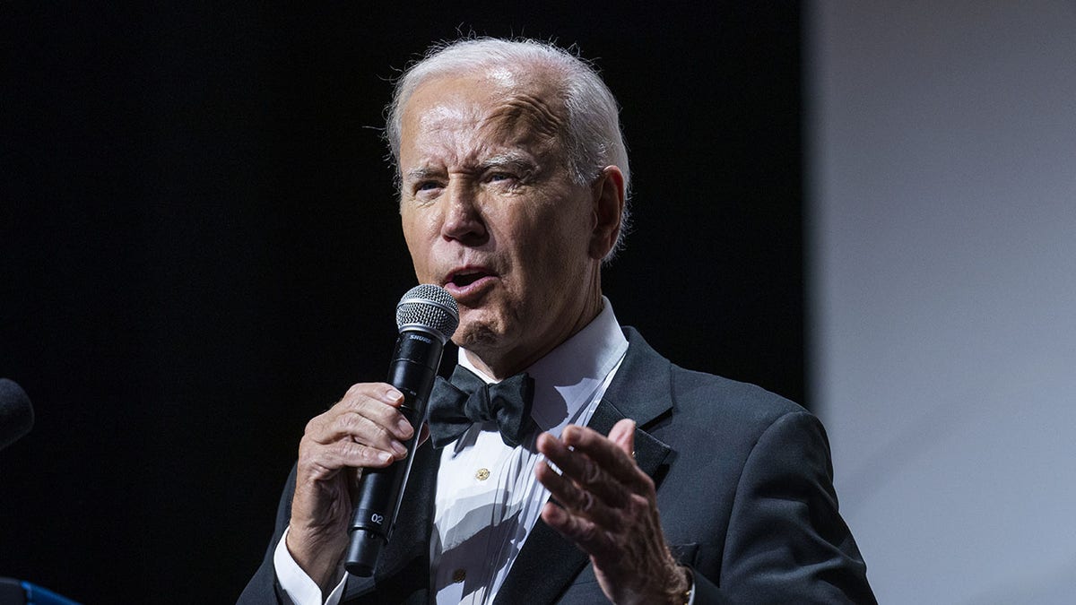 Biden speaking in a tuxedo