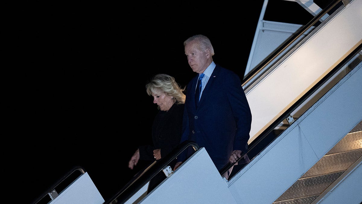 Biden and first lady getting off Air Force One in London