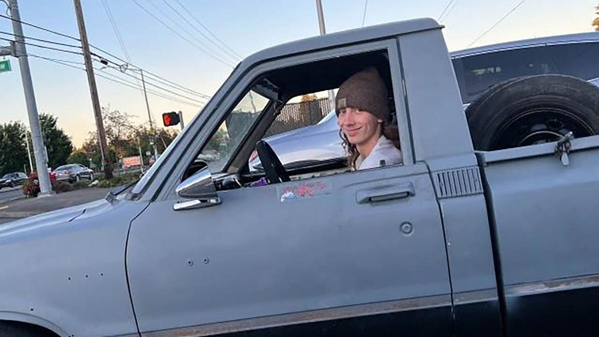 Cameron Taylor sitting in a truck