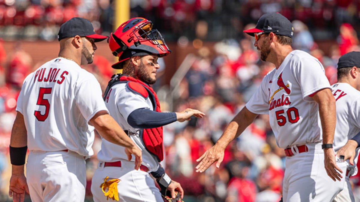 Albert Pujols, Yadier Molina, and Adam Wainwright