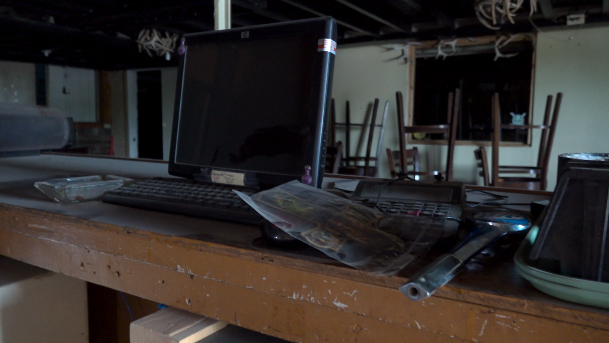 Dusty cash register in abandoned restaurant