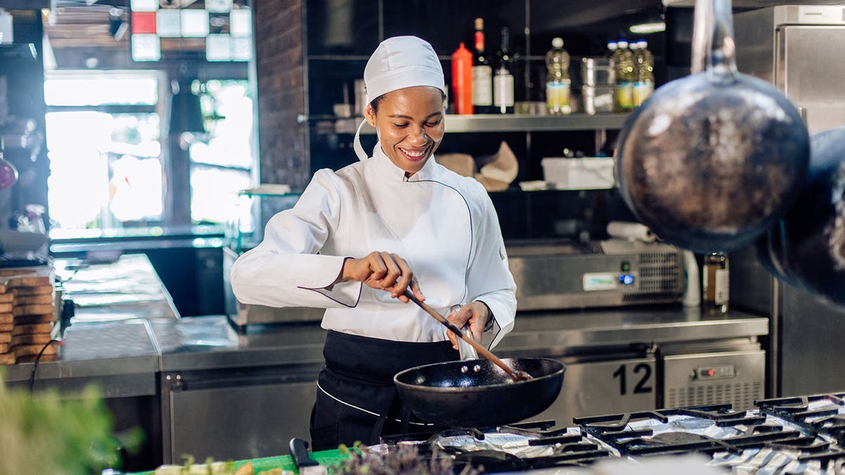 student in chef hat