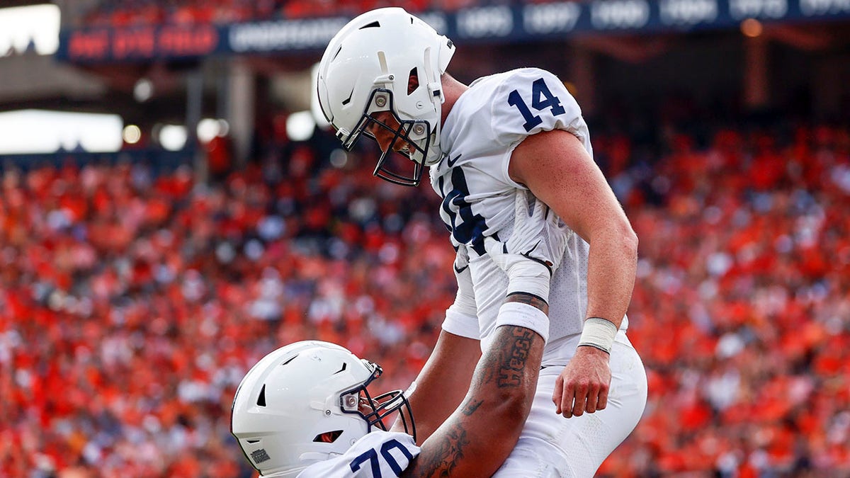 Sean Clifford celebrates touchdown