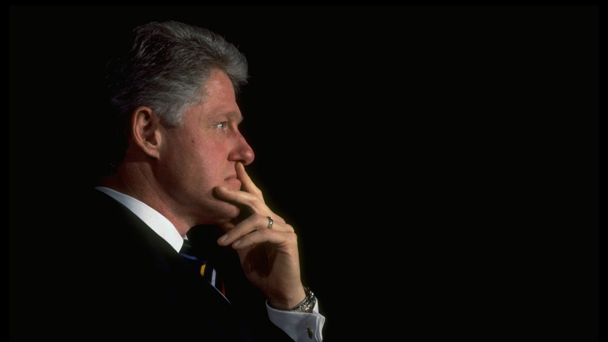 Pres. Bill Clinton striking pensive stance