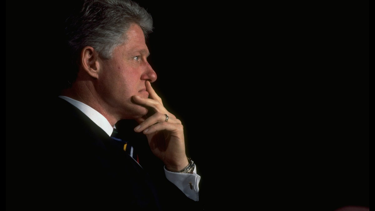 Pres. Bill Clinton striking pensive stance