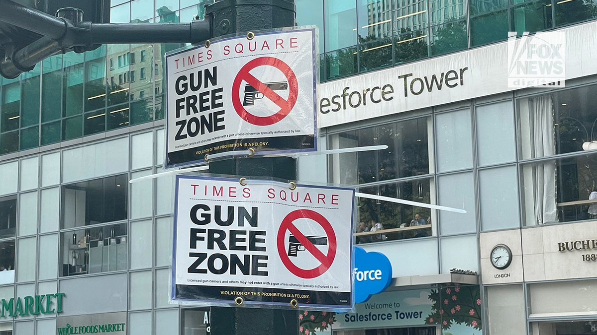 two signs posted in the gun free zone