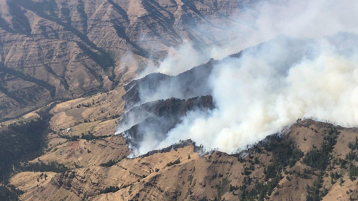 Double Creek Fire burning in moutnains