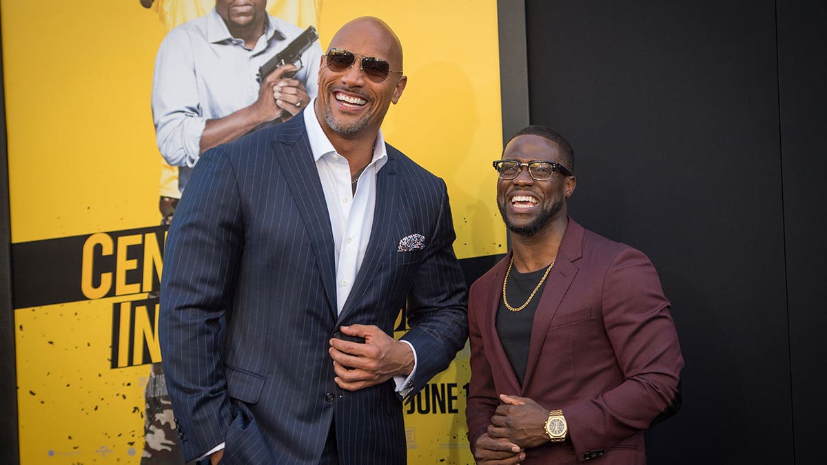 Dwayne Johnson and Kevin Hart together at an event