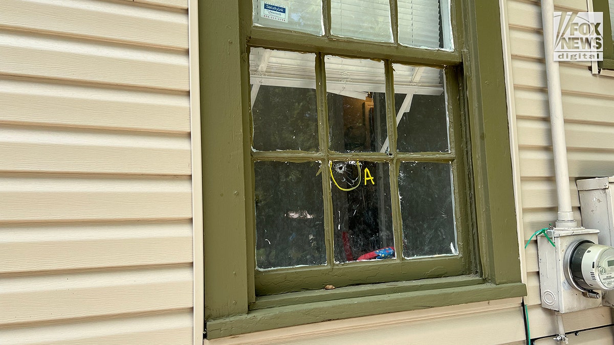 Bullet hole in Memphis window where Dewayne Tunstall was shot