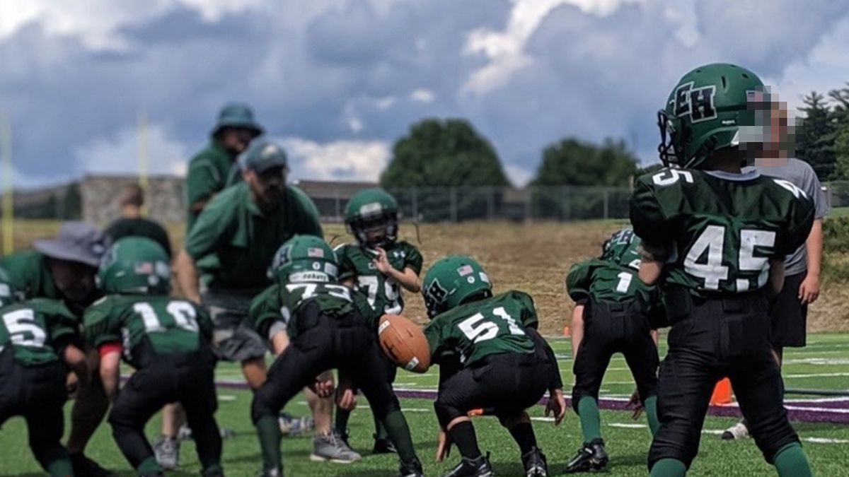 Young athletes with East Henderson Youth Football and Cheerleading League