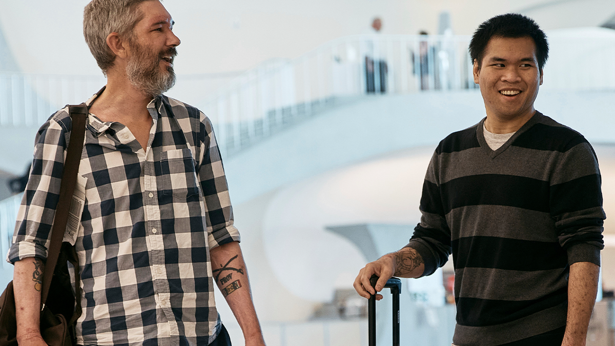 Andy Huynh and Alex Drueke return to America after being captured by Russian forces