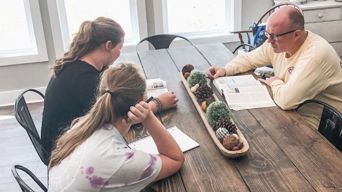 Alan Gaddy and kids during homeschool lessons