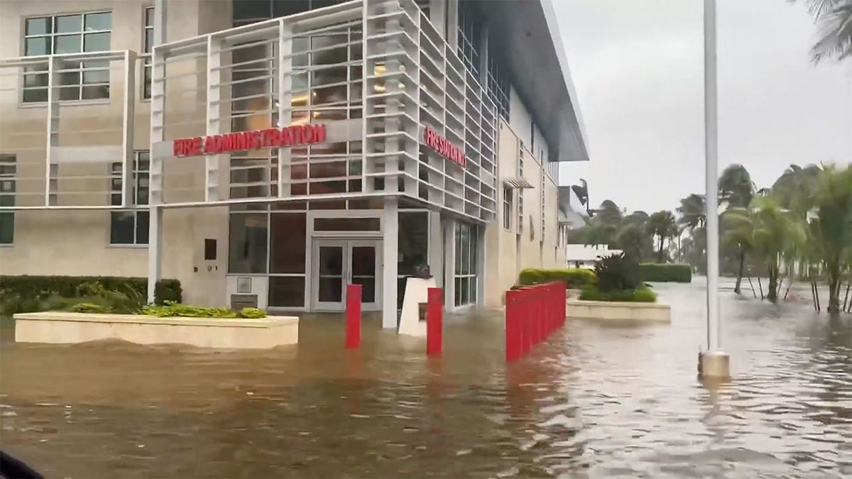 The Naples Fire Department is flooded along with surrounding streets during Hurricane Ian