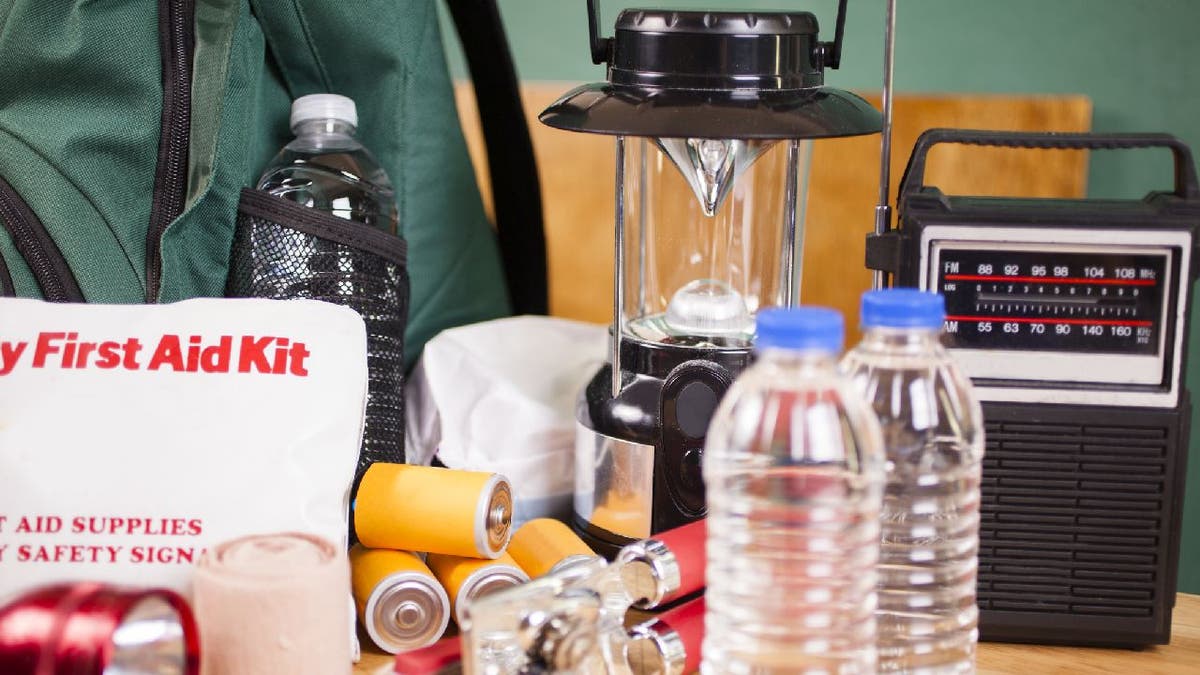 Emergency go bag supplies on a table