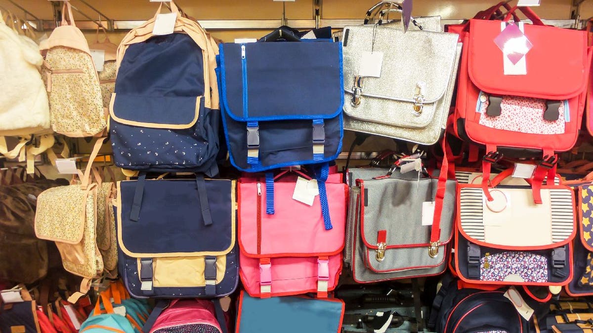 Backpacks stacked in store
