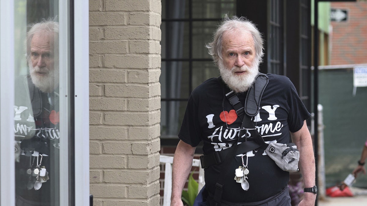 James Lewis wearing an "I love NYC" T-shirt