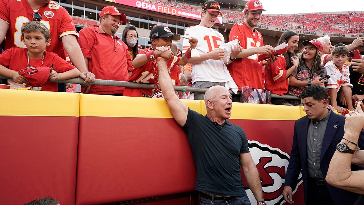 Jeff Bezos with Chiefs fans