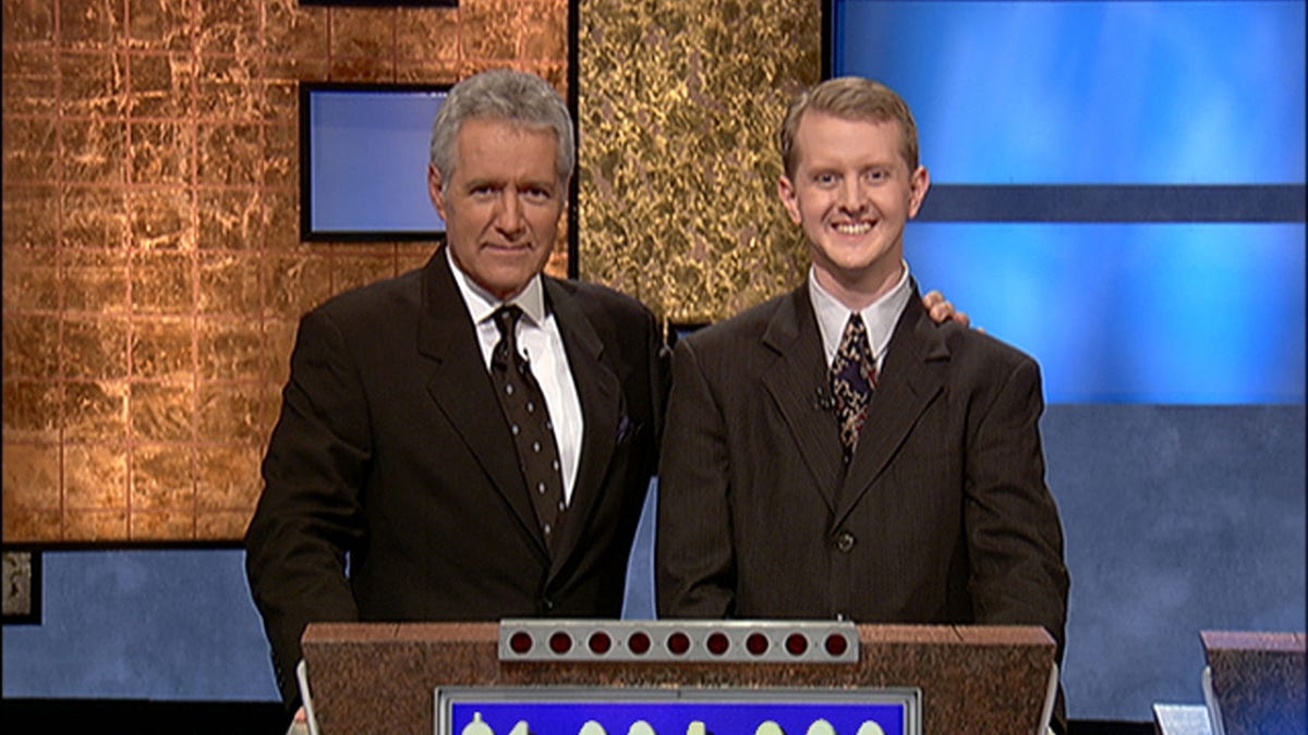 ALex Trebek poses with Ken Jennings