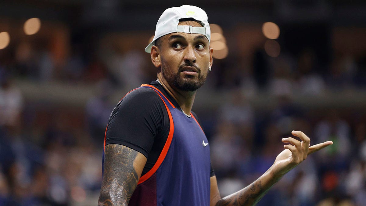 Tennis star Nick Kyrgios pointing at the US Open in NYC