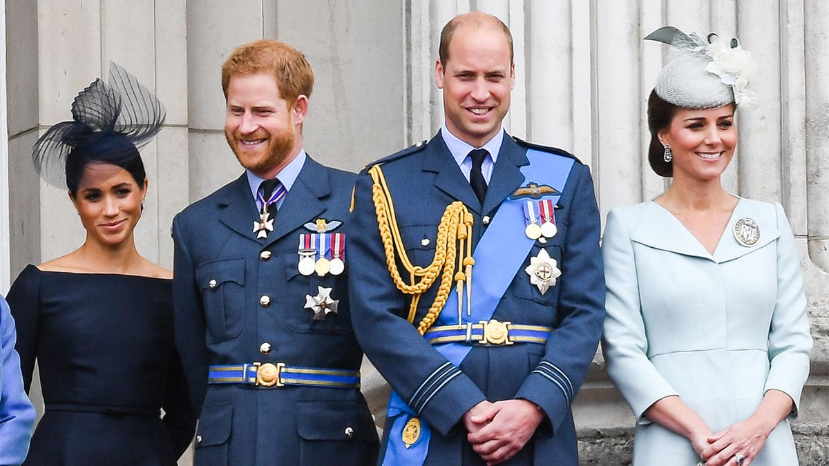 A photo of Princes William and Harry standing side-by-side