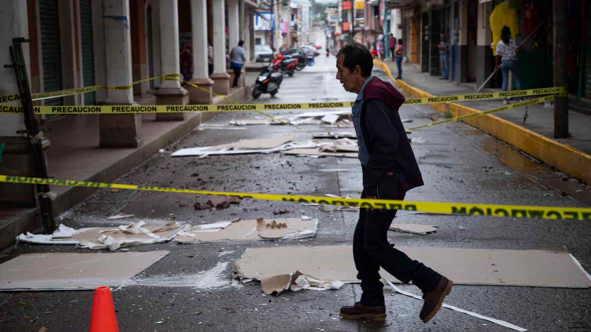 Man walks in Mexican street destroyed by earthquake