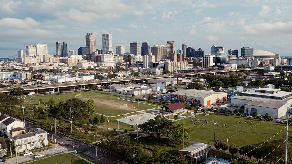 Photo shows skyline of New Orleans on sunny day in 2021