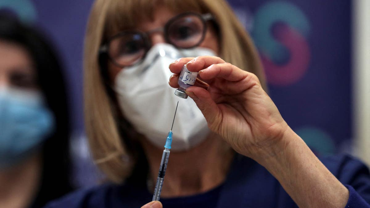 Nurse preparing vaccine