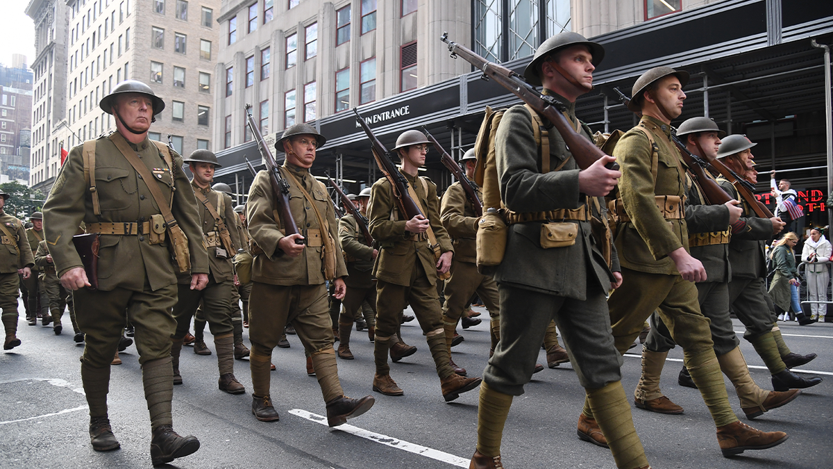 Photos show people dressed as World War 1 servicemembers during reenactment in NYC