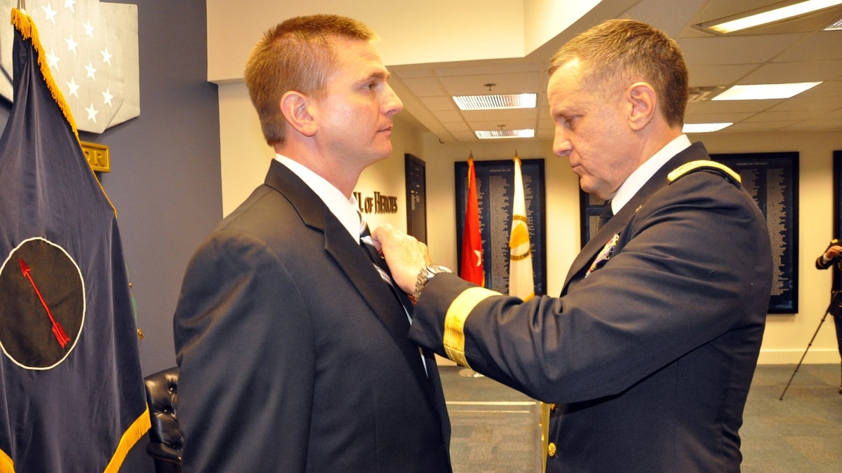 North Carolina Army veteran David Jensen receives an award