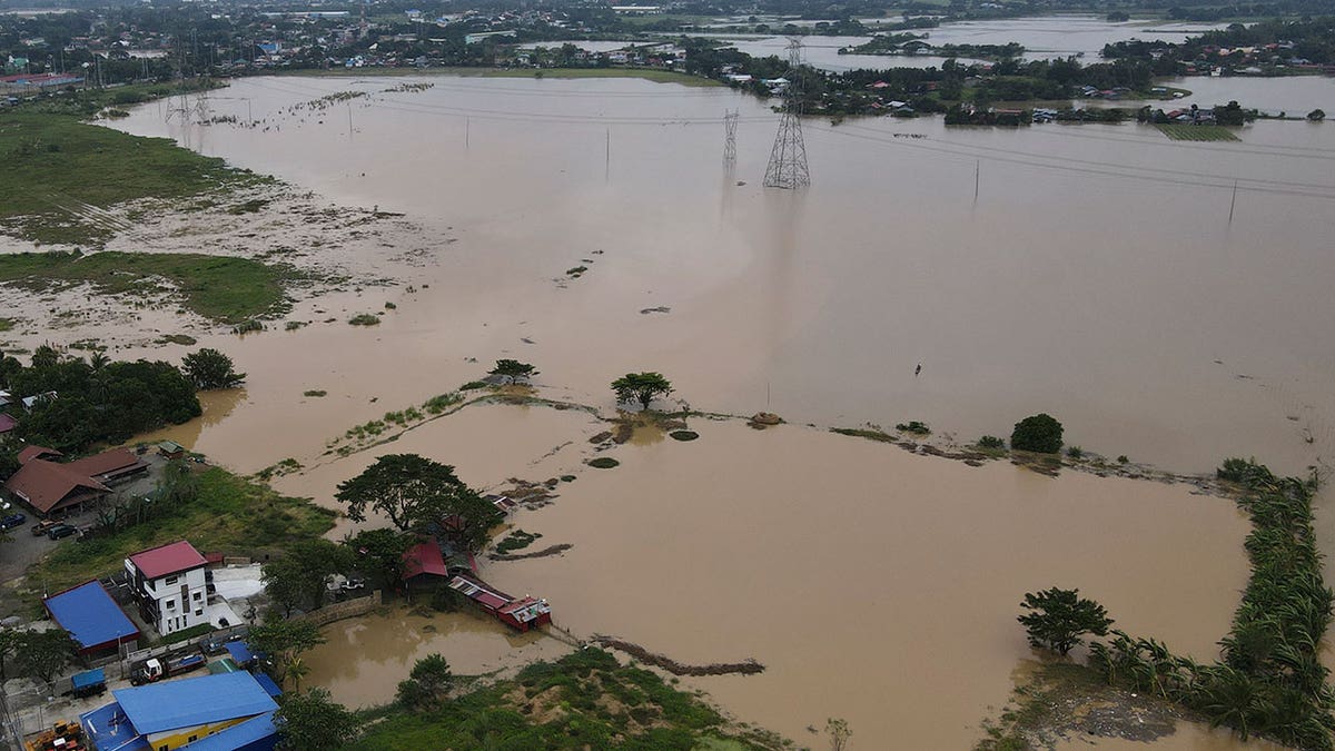 An aerial view of a flooded area of the Phillipines covered in muddy water