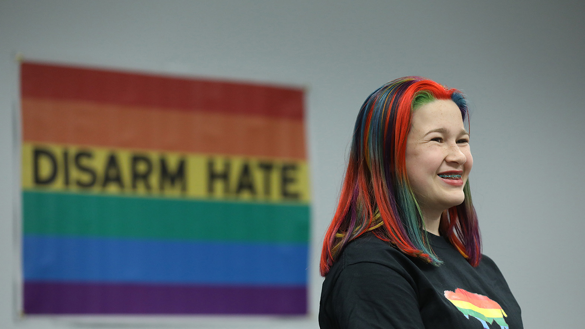 Activist Molly Pinta smiles while attending a meeting 