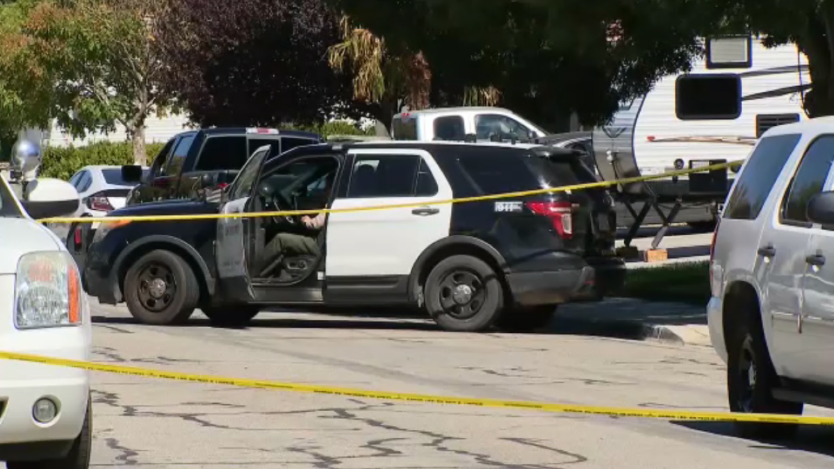 Officers outside house