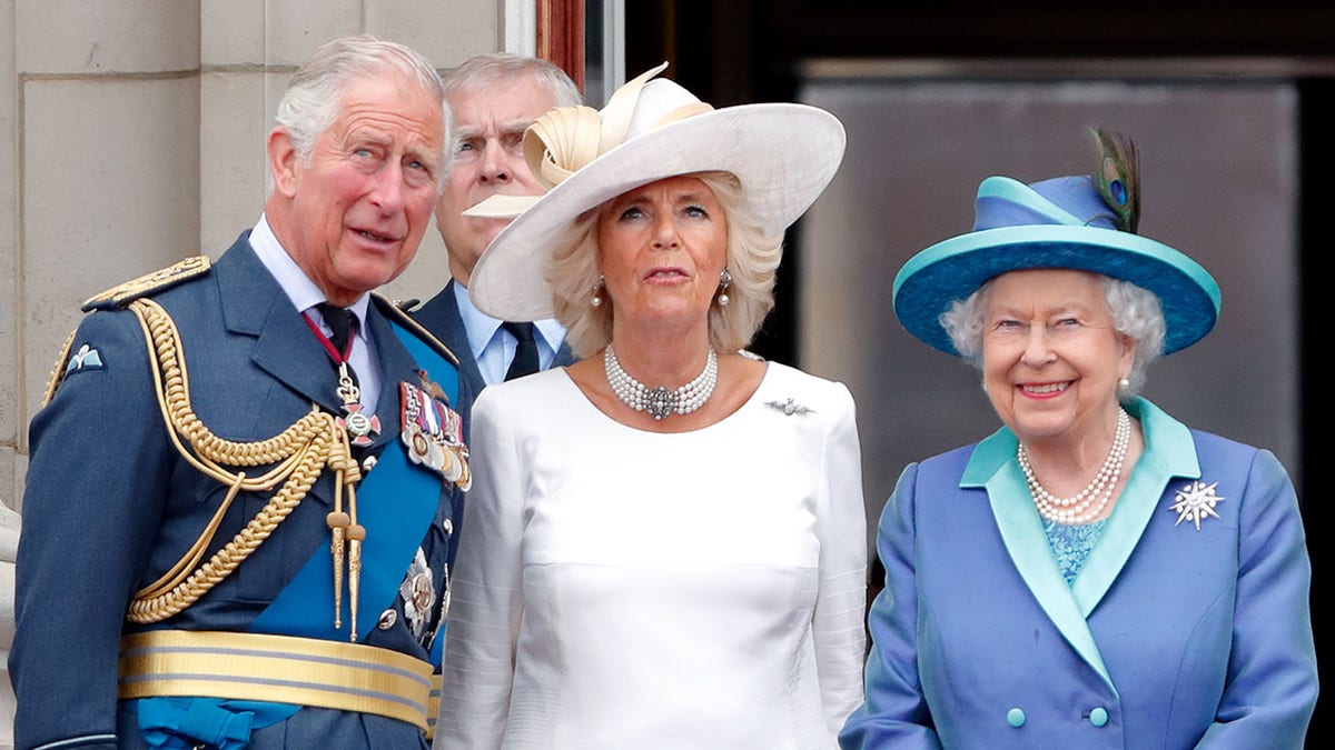 The queen with Camilla and Charles