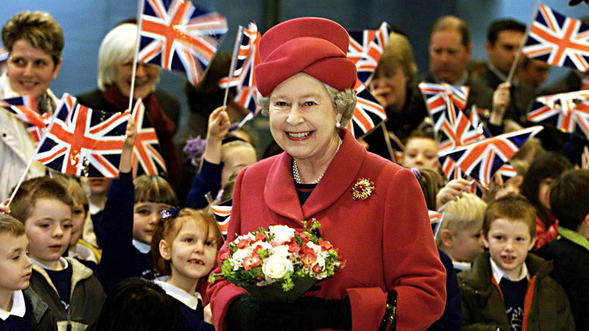 Queen Elizabeth II visits children