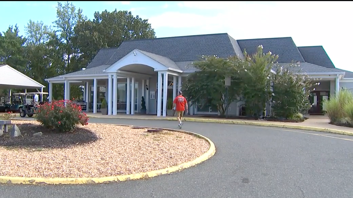 Photo shows exterior entrance to Clubhouse at Aquia Harbour in Stafford County, VA 