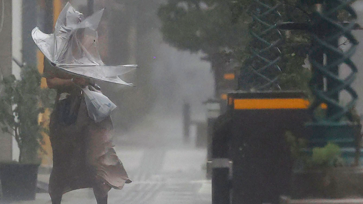 Japan sees 'unprecedented' typhoon slam onto shore, causing power outages and massive evacuations