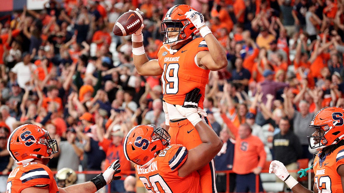 Oronde Gadsden celebrates touchdown