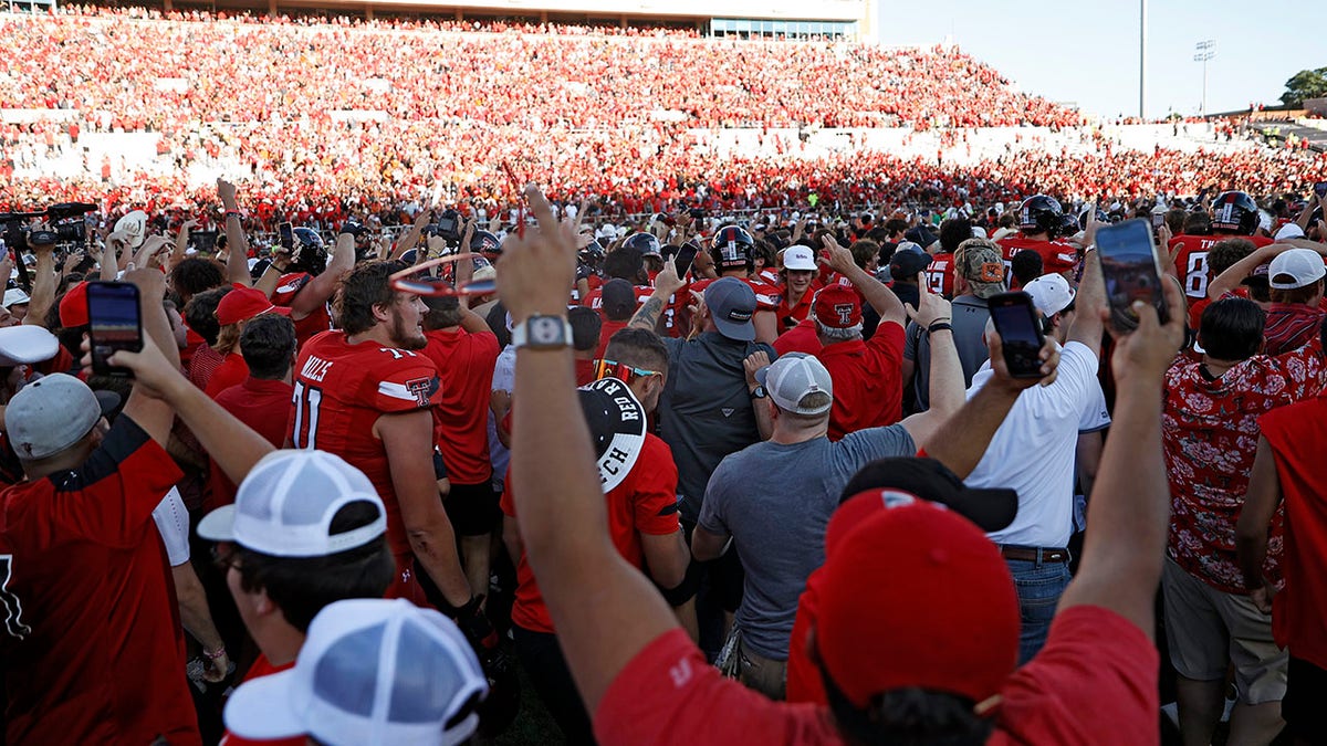 Texas Tech fans rush field