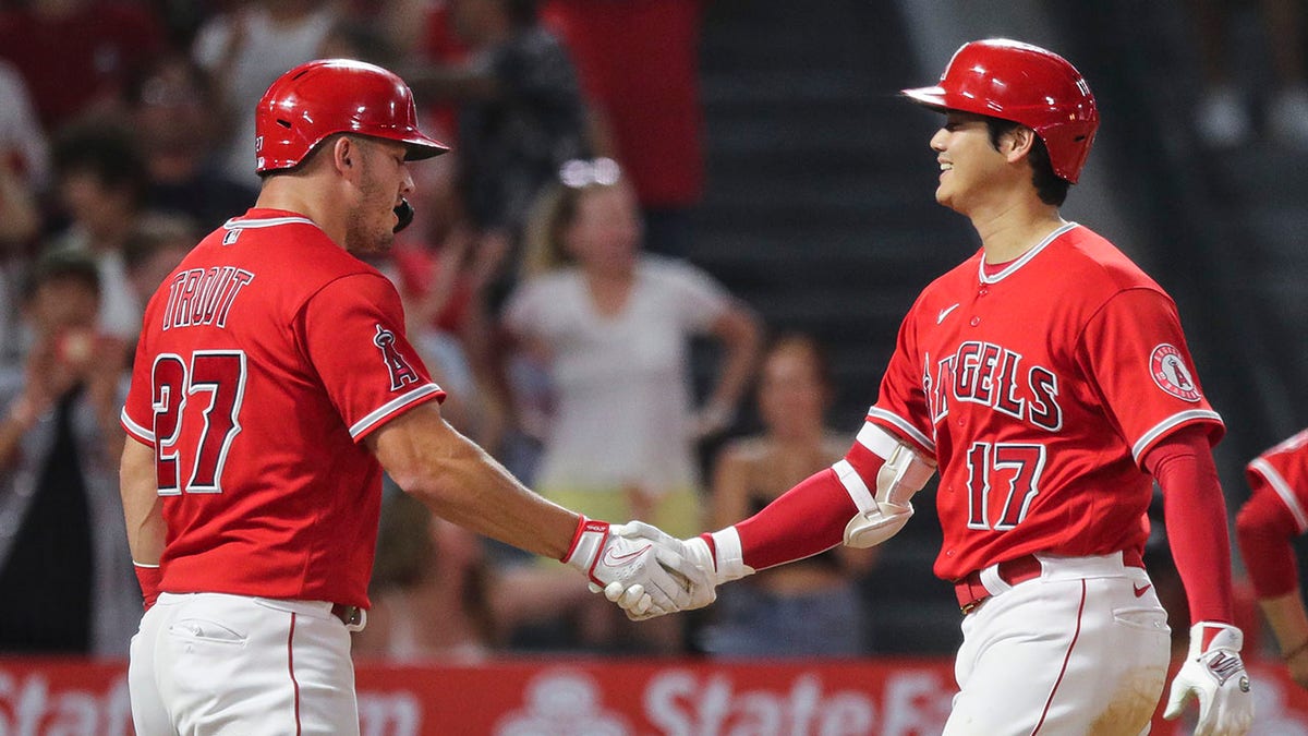 Mike Trout and Shohei Ohtani shake hands