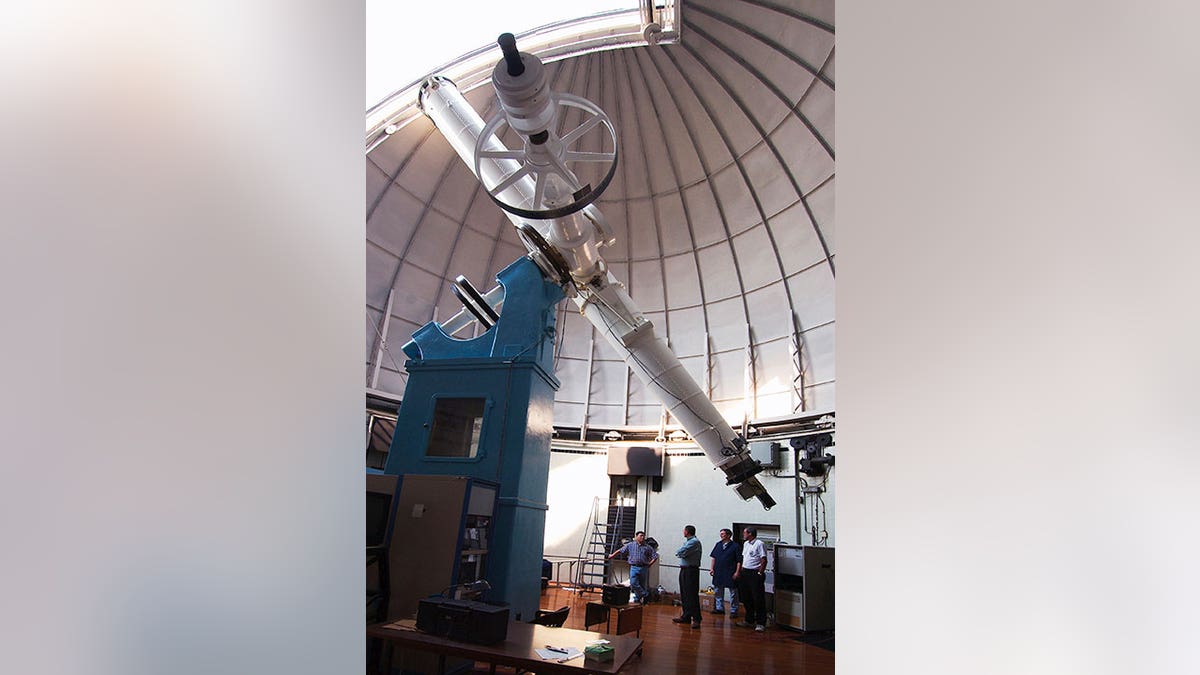 US Naval Observatory refractor inside an obersvatory lab