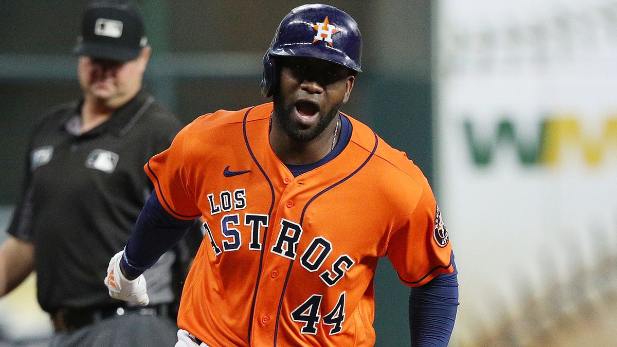 Yordan Alvarez celebrates home run